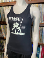 Black tank top with white graphic and text on a mannequin in front of vinyl stacks.