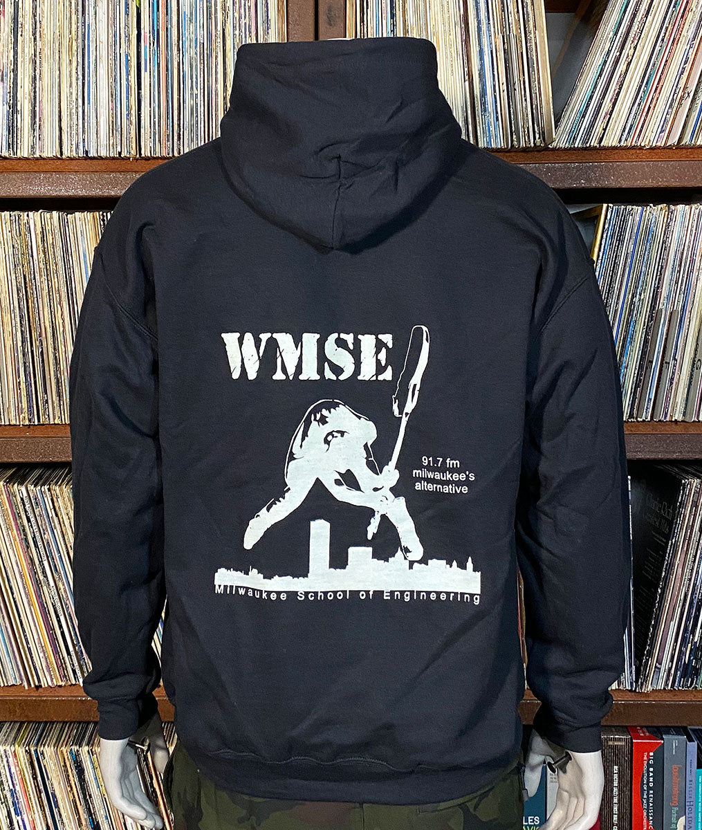 Black hoodie with 'WMSE' logo on the back, worn by a person in front of vinyl stacks.