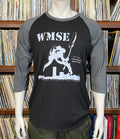 Black and gray baseball shirt with 'WMSE' logo on a mannequin in front of a recordshelf.